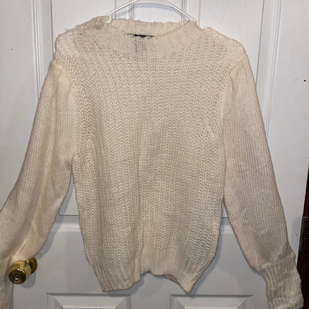 White turtleneck sweater